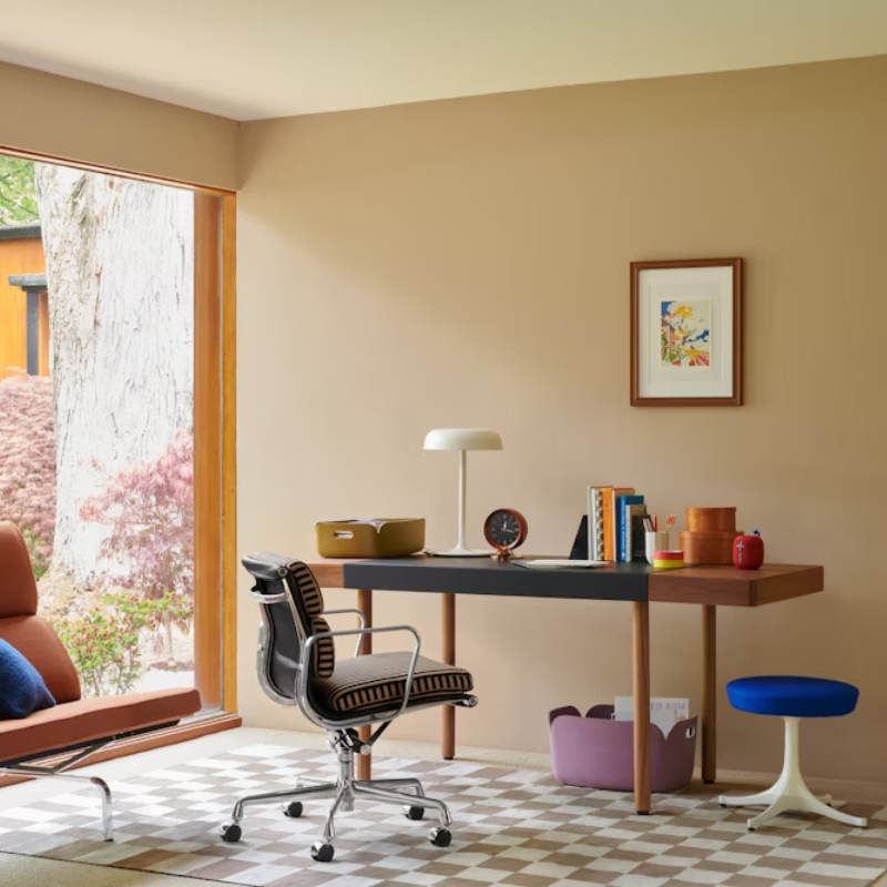 The Ode Desk Lamp from Herman Miller in an office.