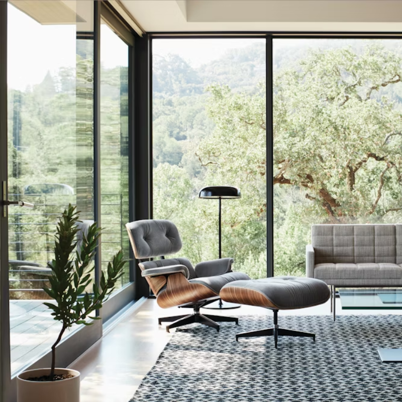 The Ode Freestanding Floor Lamp from Herman Miller in an office.