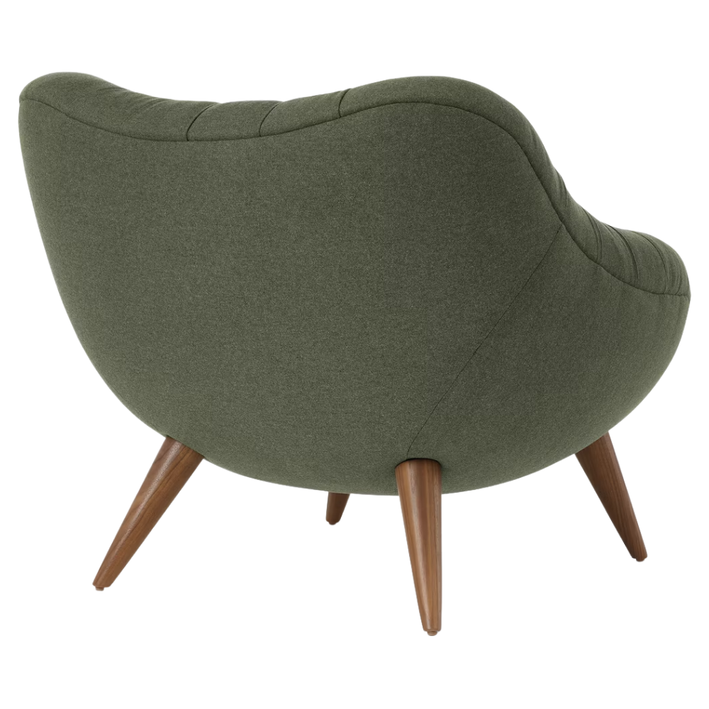 The Rohde Easy Chair from Herman Miller with the agrarian luce upholstery and walnut leg finish from the back at an angle.