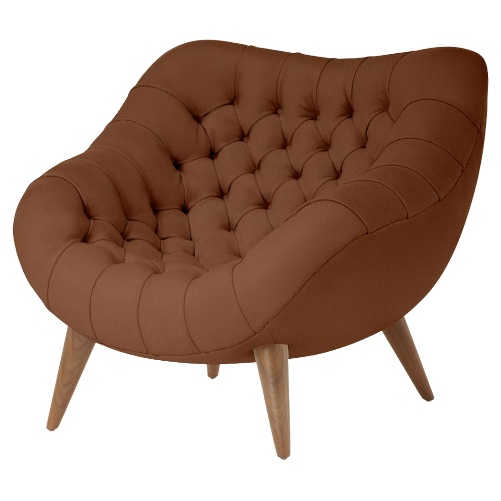 The Rohde Easy Chair from Herman Miller with the ledge prone leather upholstery and walnut leg finish.