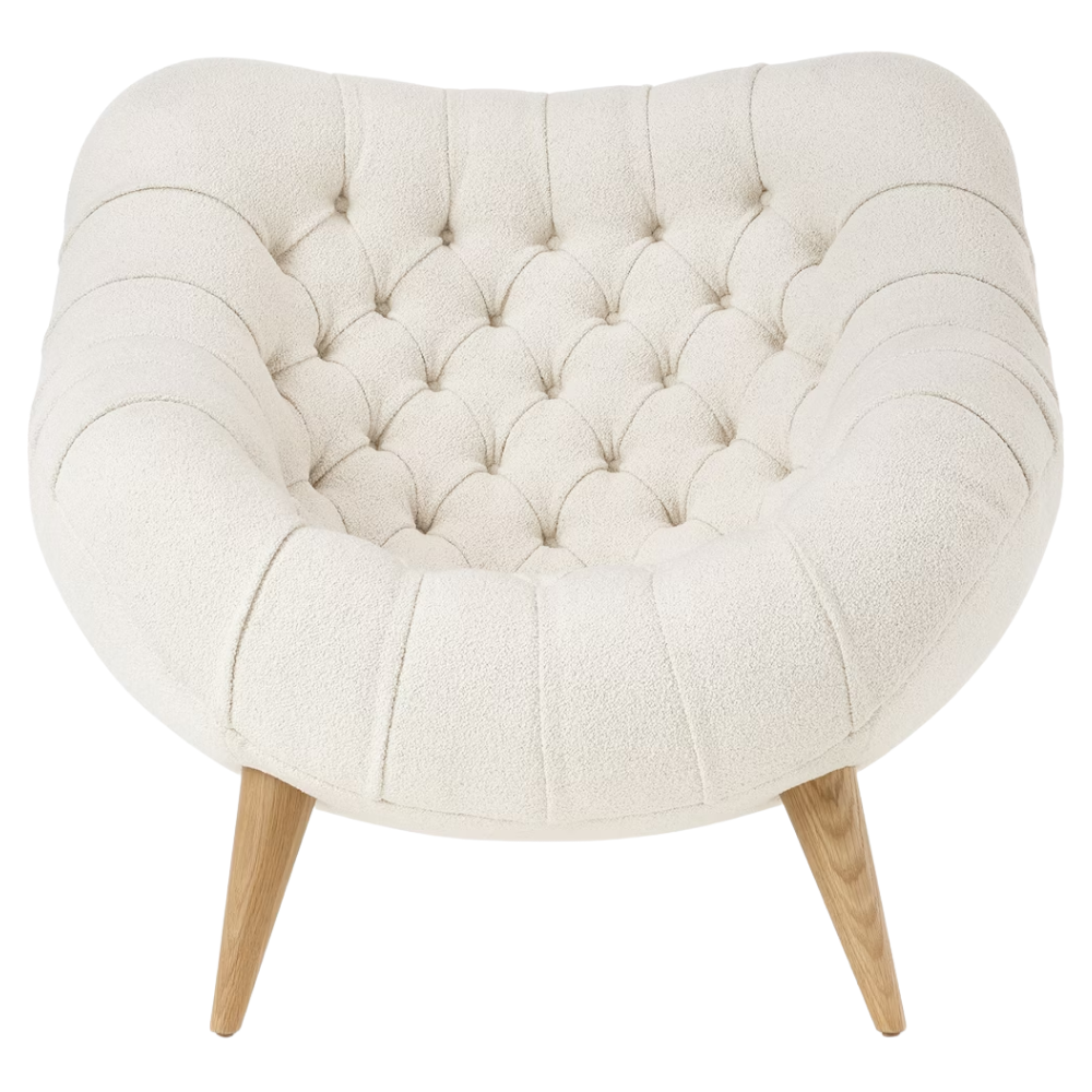The Rohde Easy Chair from Herman Miller with the warm white whim upholstery and oak leg finish from the front.