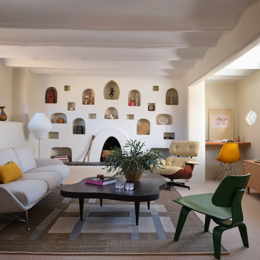The ebony Rohde Paldao Coffee Table from Herman Miller in a living room.
