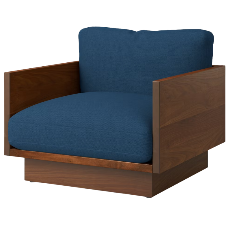 The Tudor Walnut Pawson Drift Lounge Chair from Herman Miller with mode denim upholstery.