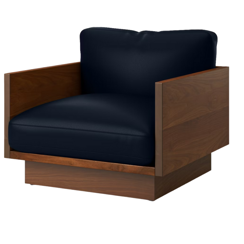 The Tudor Walnut Pawson Drift Lounge Chair from Herman Miller with prone leather sail upholstery.