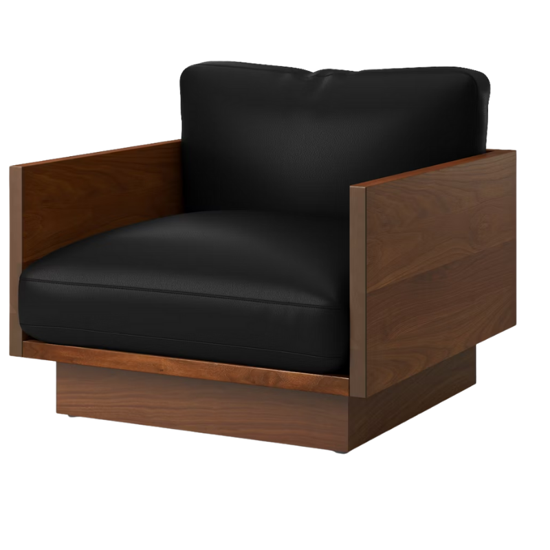 The Tudor Walnut Pawson Drift Lounge Chair from Herman Miller with raise leather black upholstery.