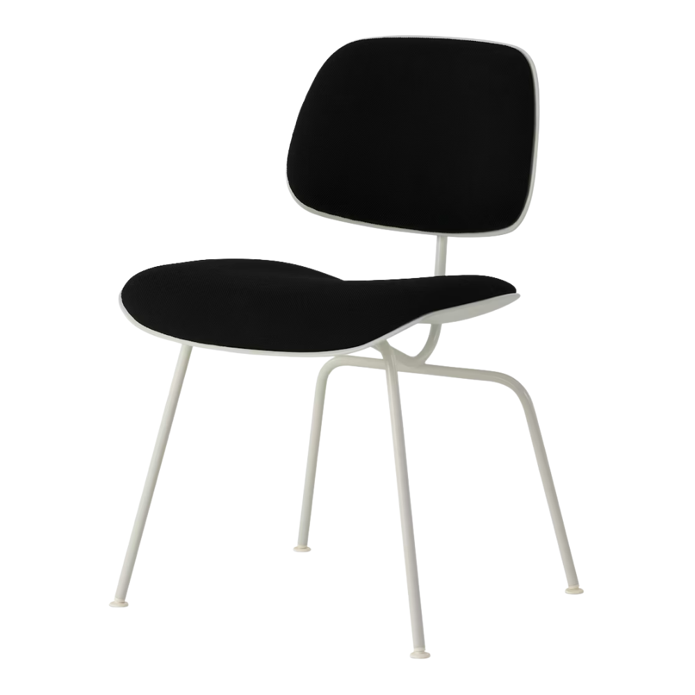 The Upholstered Eames Molded Plastic Dining Chair from Herman Miller with black hopsak upholstery, white shell and white leg finish.