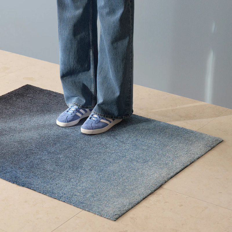 The Dis Doormat from Heymat in fjord in a living room.