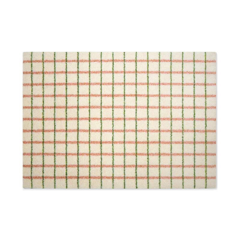 The Grid Doormat from Heymat in 34 x 24 inch in lime candycane.