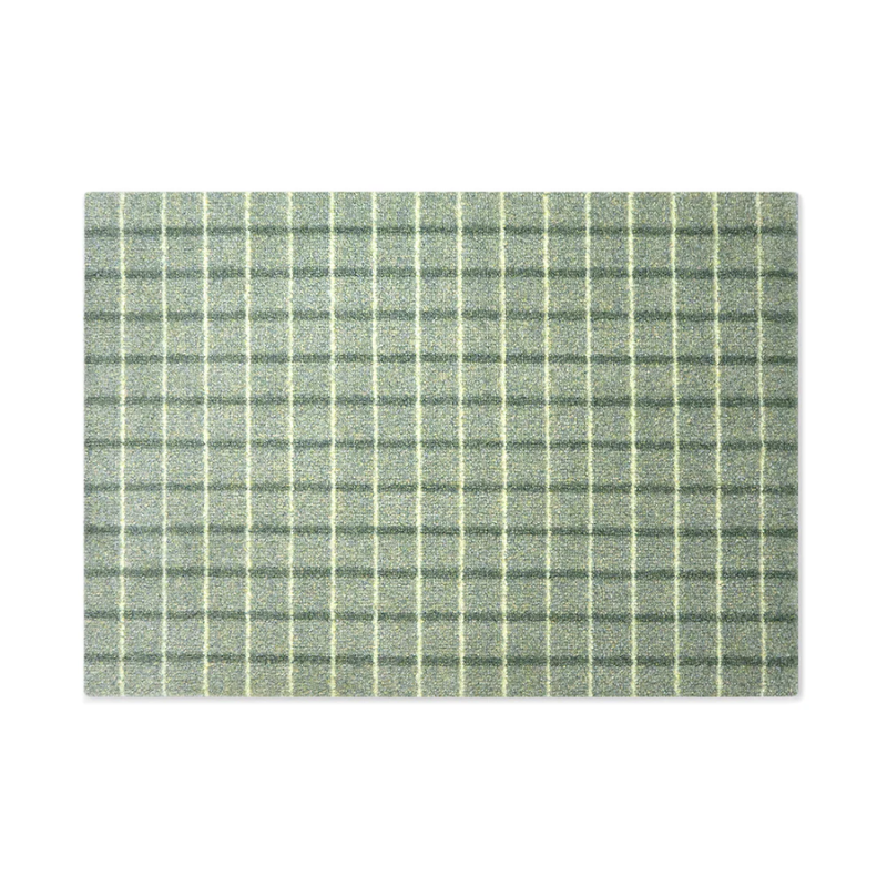 The Grid Doormat from Heymat in 34 x 24 inch in matcha lemon.