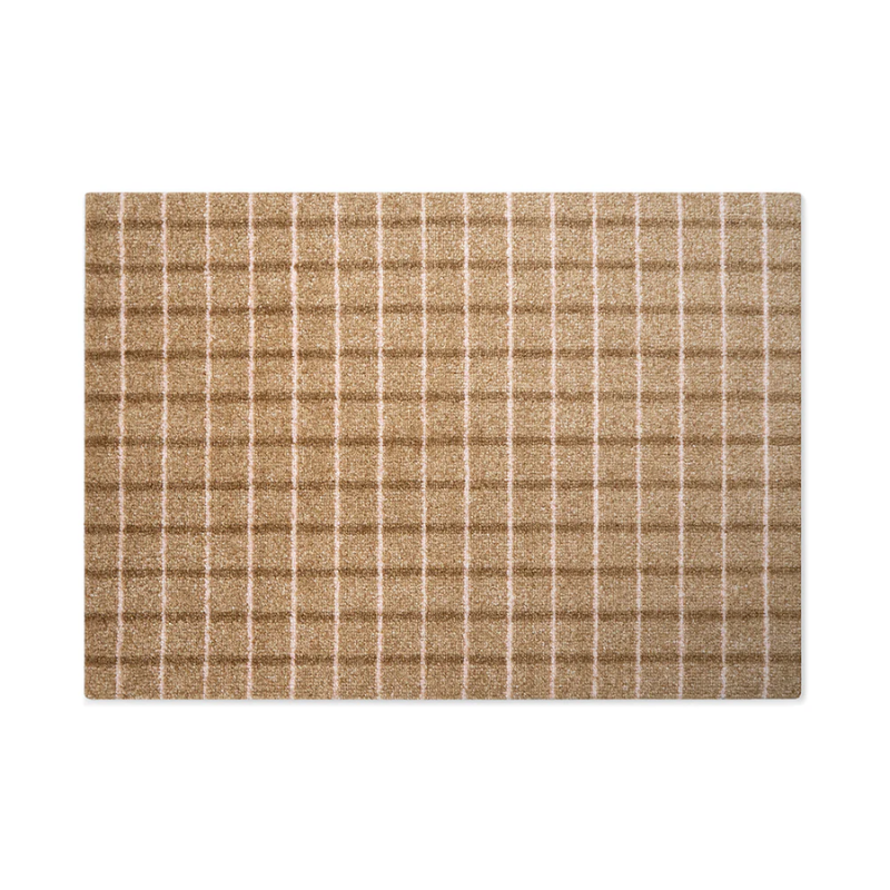 The Grid Doormat from Heymat in 44 x 32 inch in chocolate strawberry.
