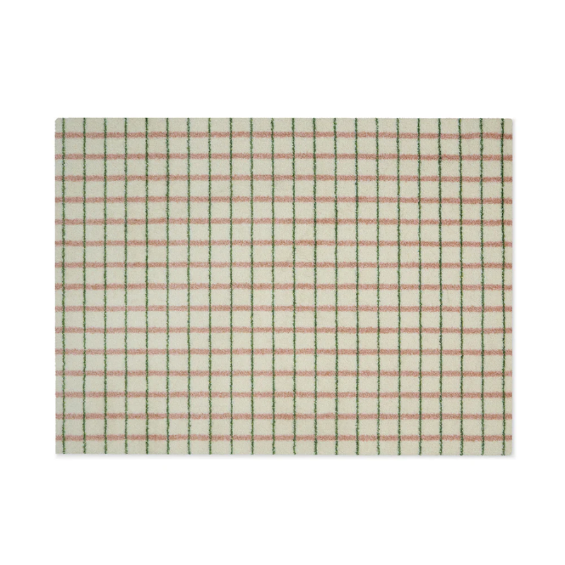 The Grid Doormat from Heymat in 44 x 32 inch in lime candycane.