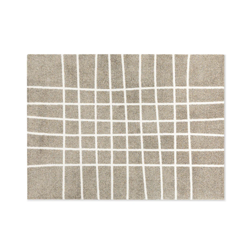 The Hand Travertine Doormat from Heymat in 44 x 32 inch size.