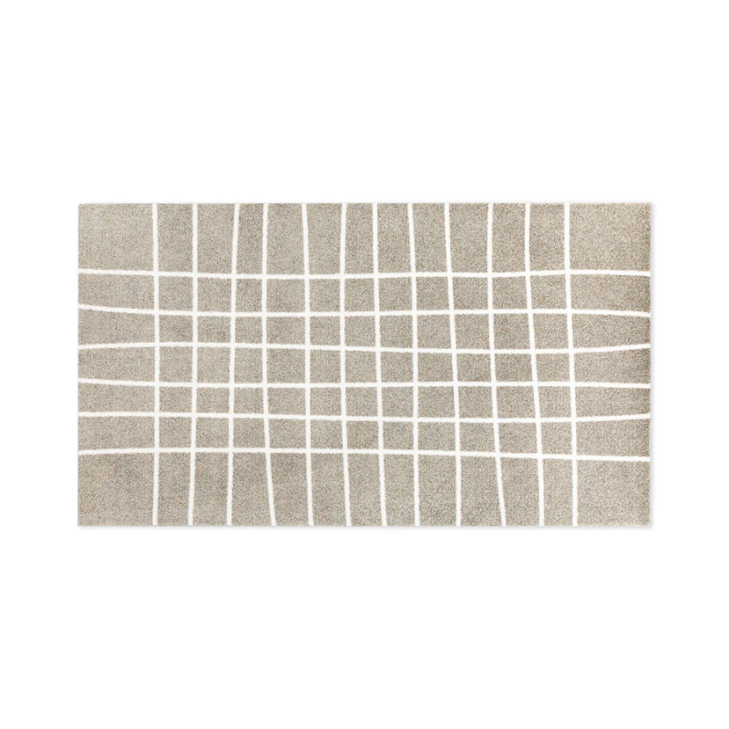 The Hand Travertine Doormat from Heymat in 57 x 32 inch size.