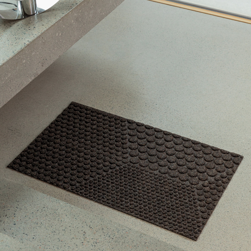 The Hex Doormat by Heymat in a home.