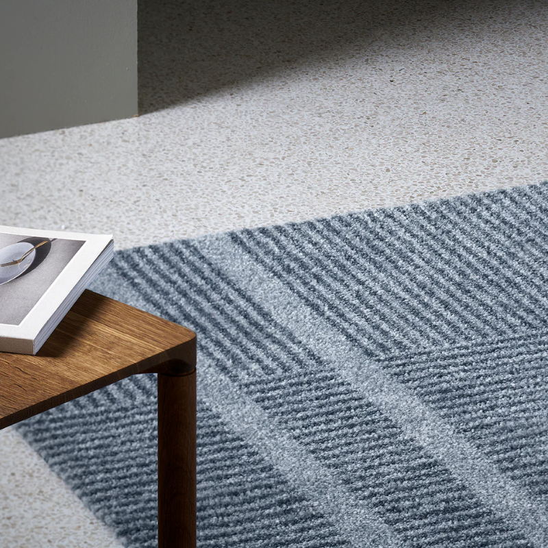 Small Løype doormat by Haymat in Cloudy Grey in living room.