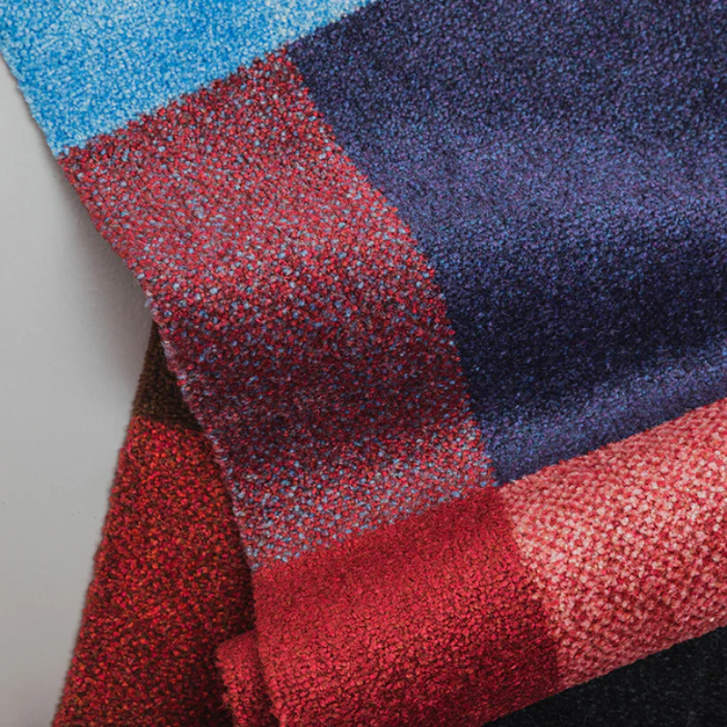 The Mix Doormat from Heymat in berry in a close up.