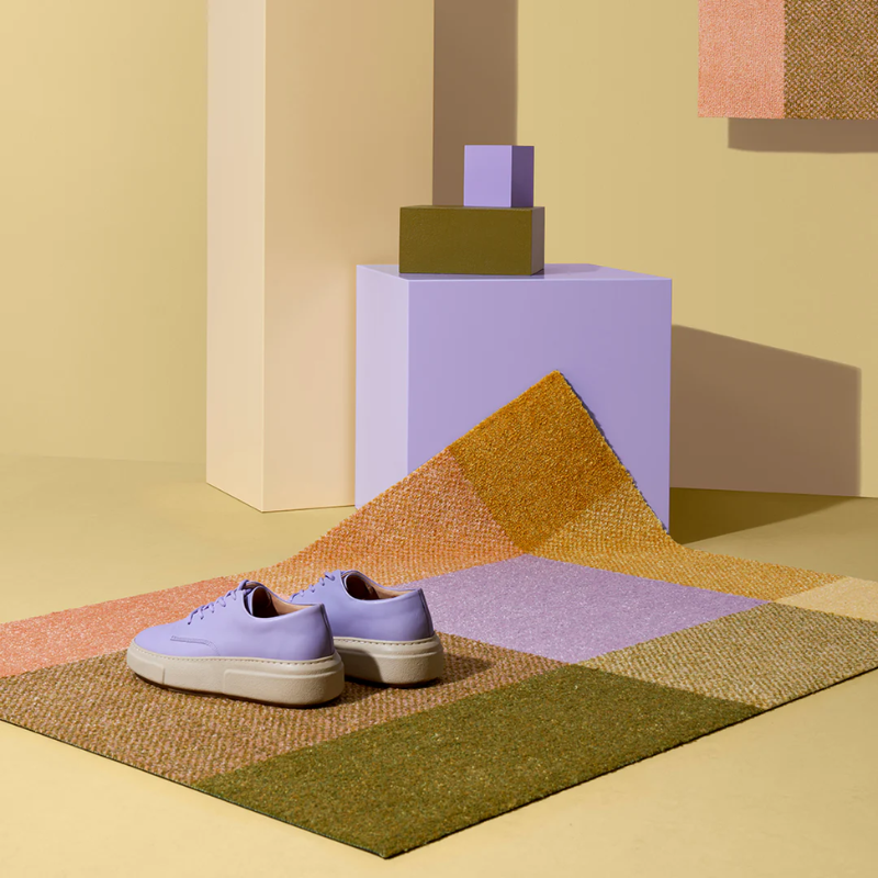 The Mix Teklan Entry Mat from Heymat in a studio.