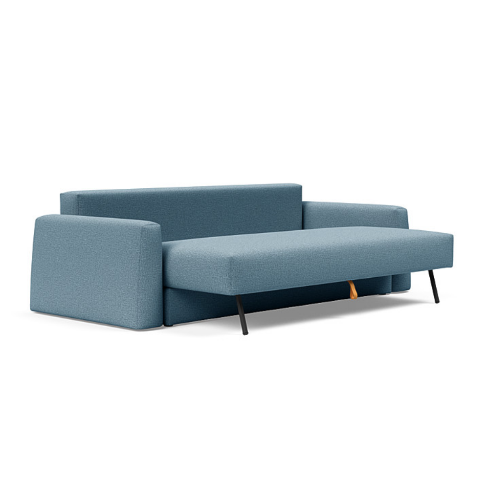 The Cone Sleeper Sofa from Innovation Living with mixed dance light blue 525 upholstery seat pulled out of the couch.