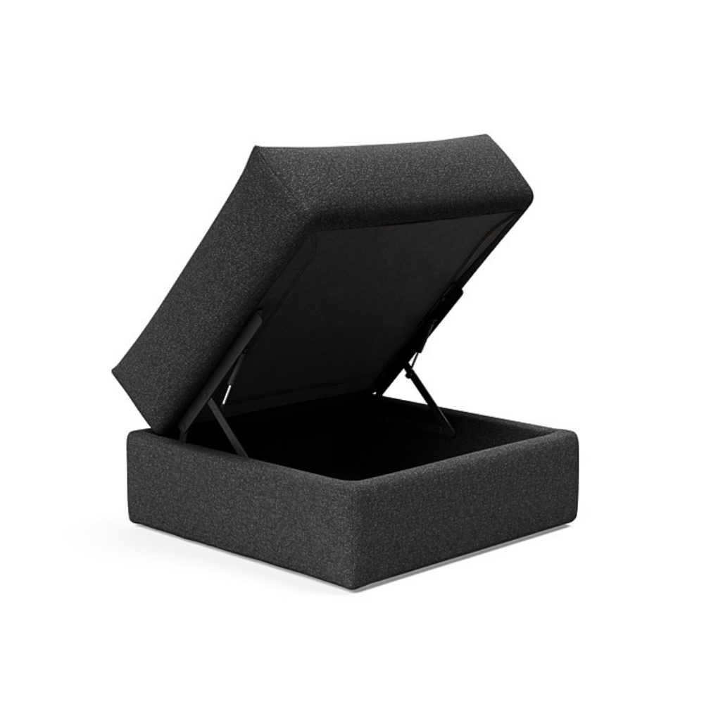 The Cornila Ottoman from Innovation Living with boucle charcoal 529 upholstery open.