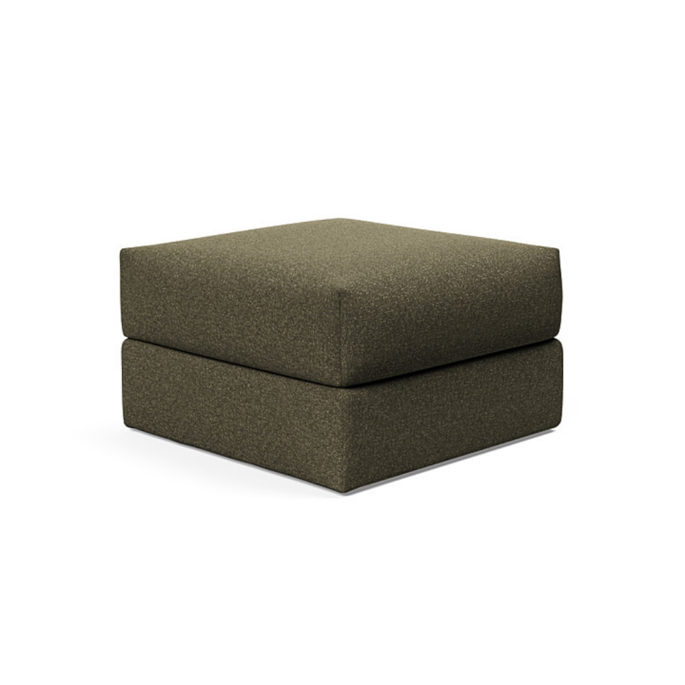 The Cornila Ottoman from Innovation Living with boucle forest green 535 upholstery.