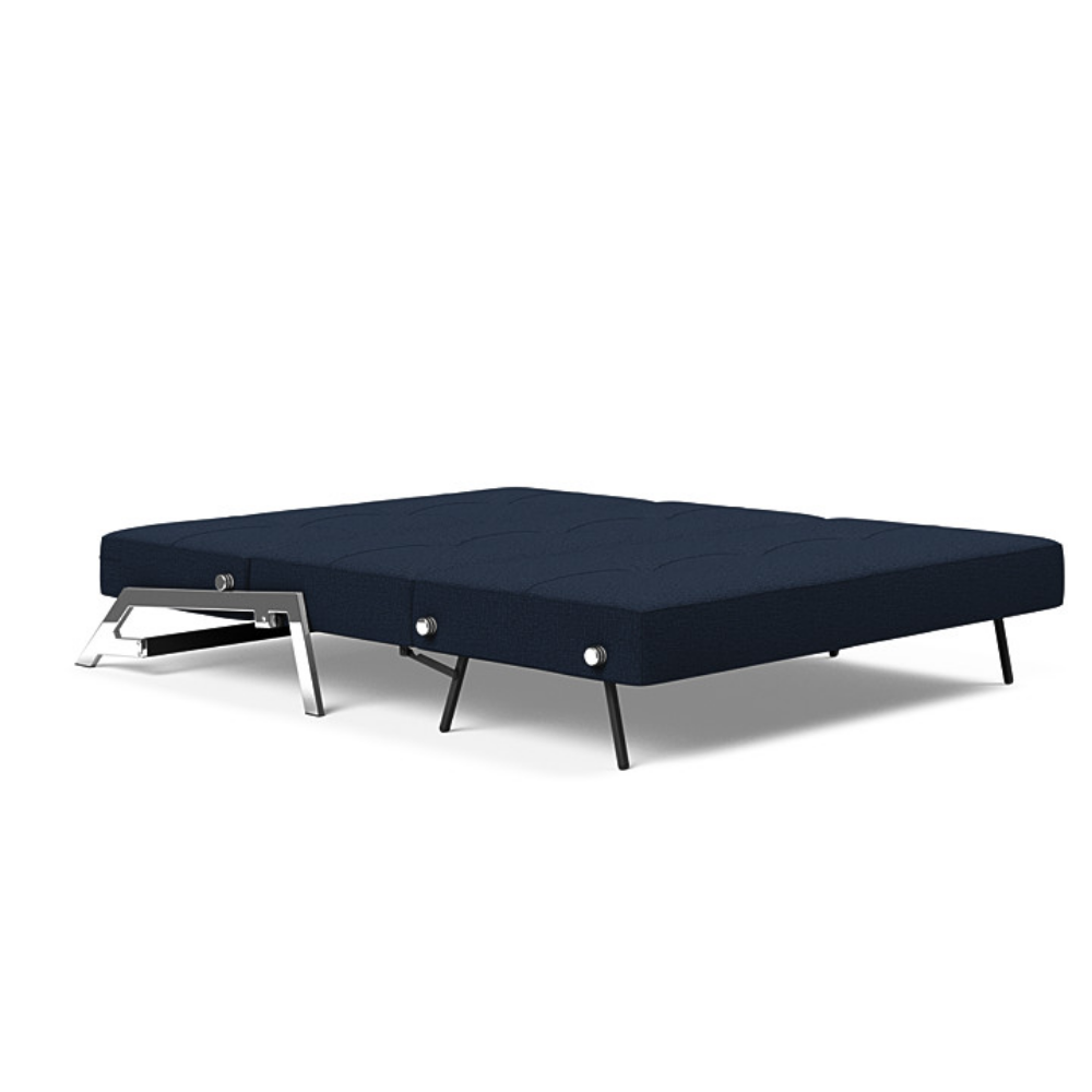 The Cubed Queen Size Sleeper Sofa with Chrome Legs from Innovation Living with mixed dance blue 528 upholstery setup as a bed.