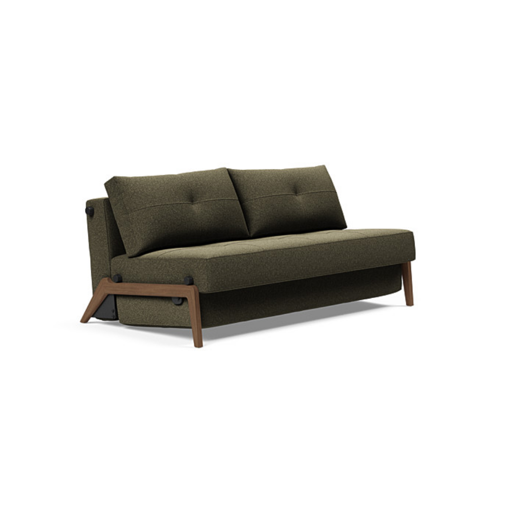 The Cubed Queen Size Sleeper Sofa with Wood Legs from Innovation Living with dark lacquered oak legs and boucle forest green 535 upholstery setup as a sofa.