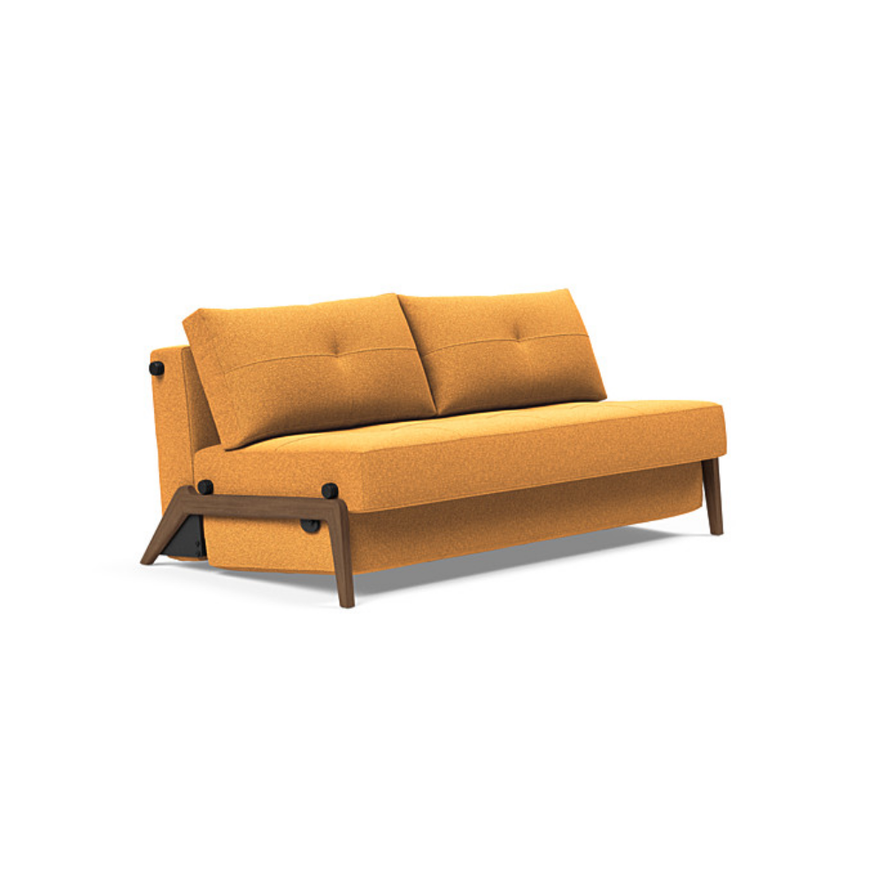 The Cubed Queen Size Sleeper Sofa with Wood Legs from Innovation Living with dark lacquered oak legs and boucle ochre 536 upholstery setup as a sofa.