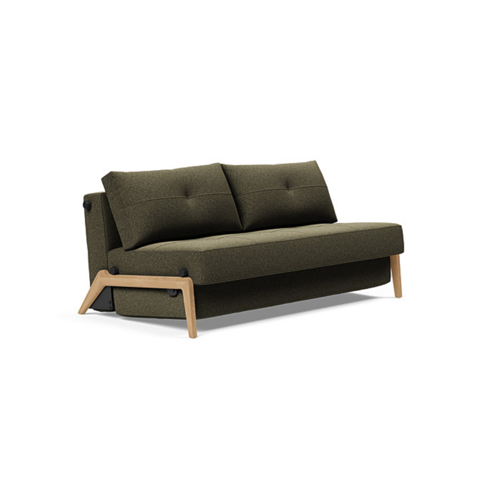 The Cubed Queen Size Sleeper Sofa with Wood Legs from Innovation Living with lacquered oak legs and boucle forest green 535 upholstery setup as a sofa.