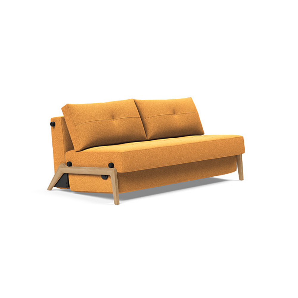 The Cubed Queen Size Sleeper Sofa with Wood Legs from Innovation Living with lacquered oak legs and boucle ochre 536 upholstery setup as a sofa.