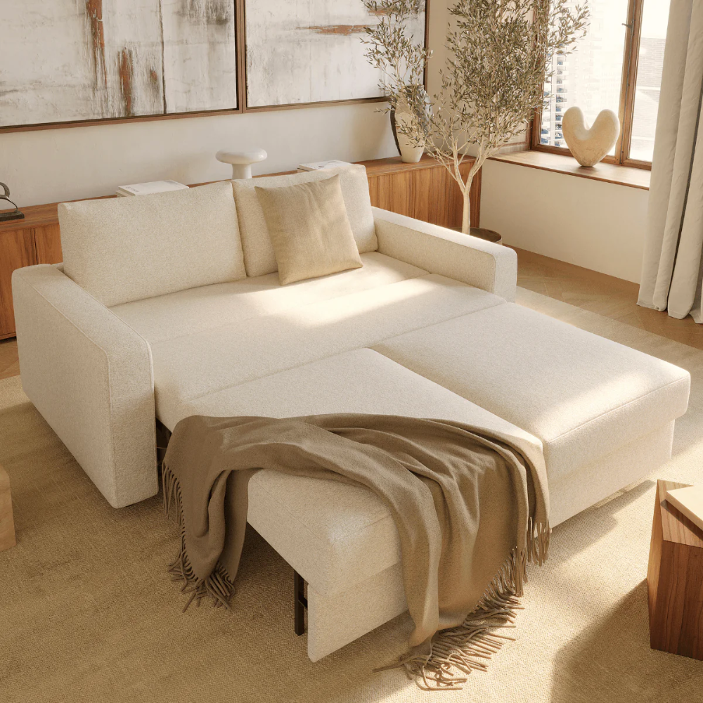 Innovation Living Neah Full Size Sofa Bed with standard arms in Halifax Shell 365 upholstery in a living room with bed pulled out