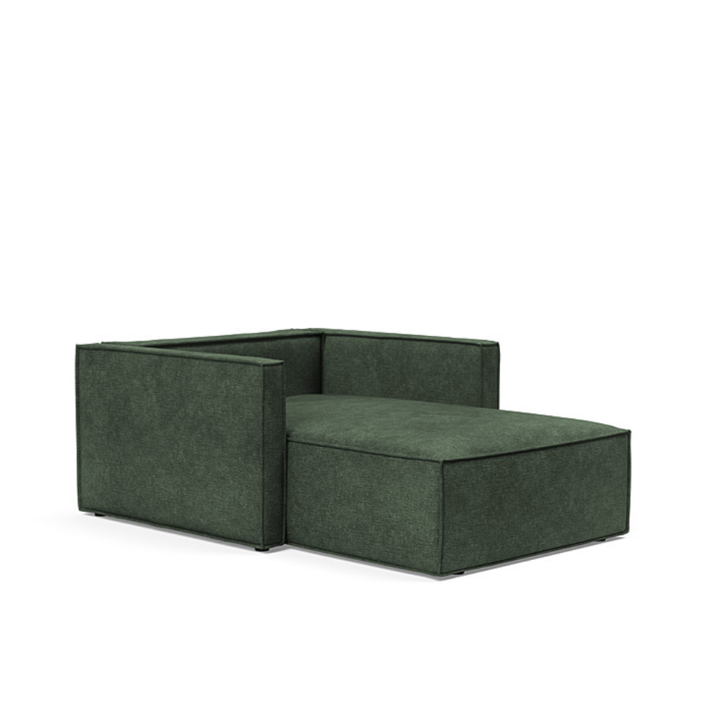 The Newilla Lounger Chair with Slim Arms with avella pine green 281 upholstery without the cushion, setup as a bed.