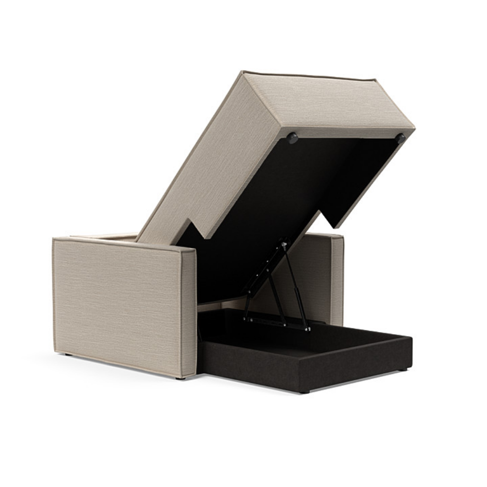 The Newilla Lounger Chair with Slim Arms with blida sand grey 612 upholstery open showing the integrated storage.