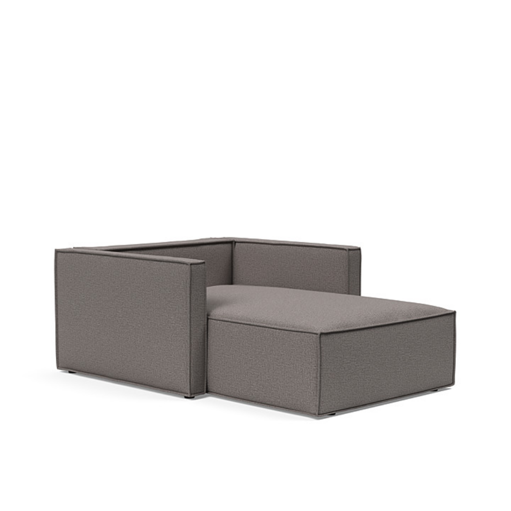 The Newilla Lounger Chair with Slim Arms with mixed dance grey 521 upholstery with the cushion, setup as a bed.