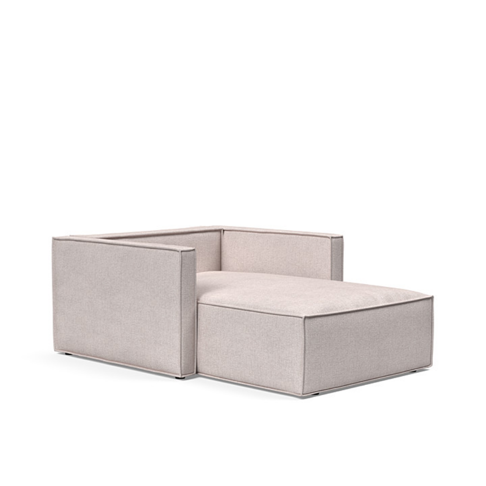 The Newilla Lounger Chair with Slim Arms with weda sand 300 upholstery without the cushion, setup as a bed.