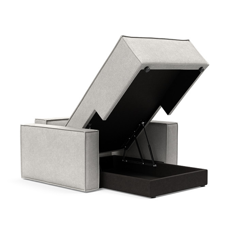 The Newilla Lounger Chair with Standard Arms from Innovation Living with adario fog 256 upholstery open and showing the internal storage.