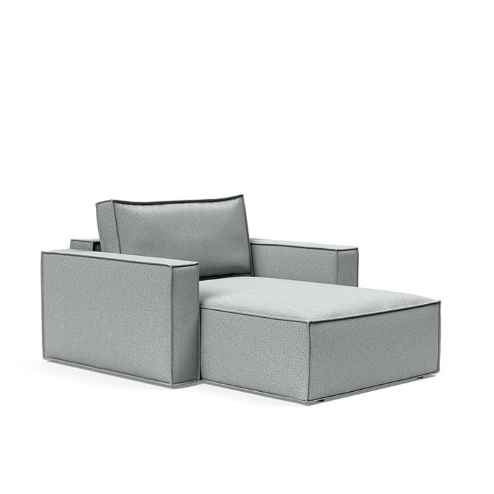 The Newilla Lounger Chair with Standard Arms from Innovation Living with melange light grey 538 upholstery setup as a lounge chair.