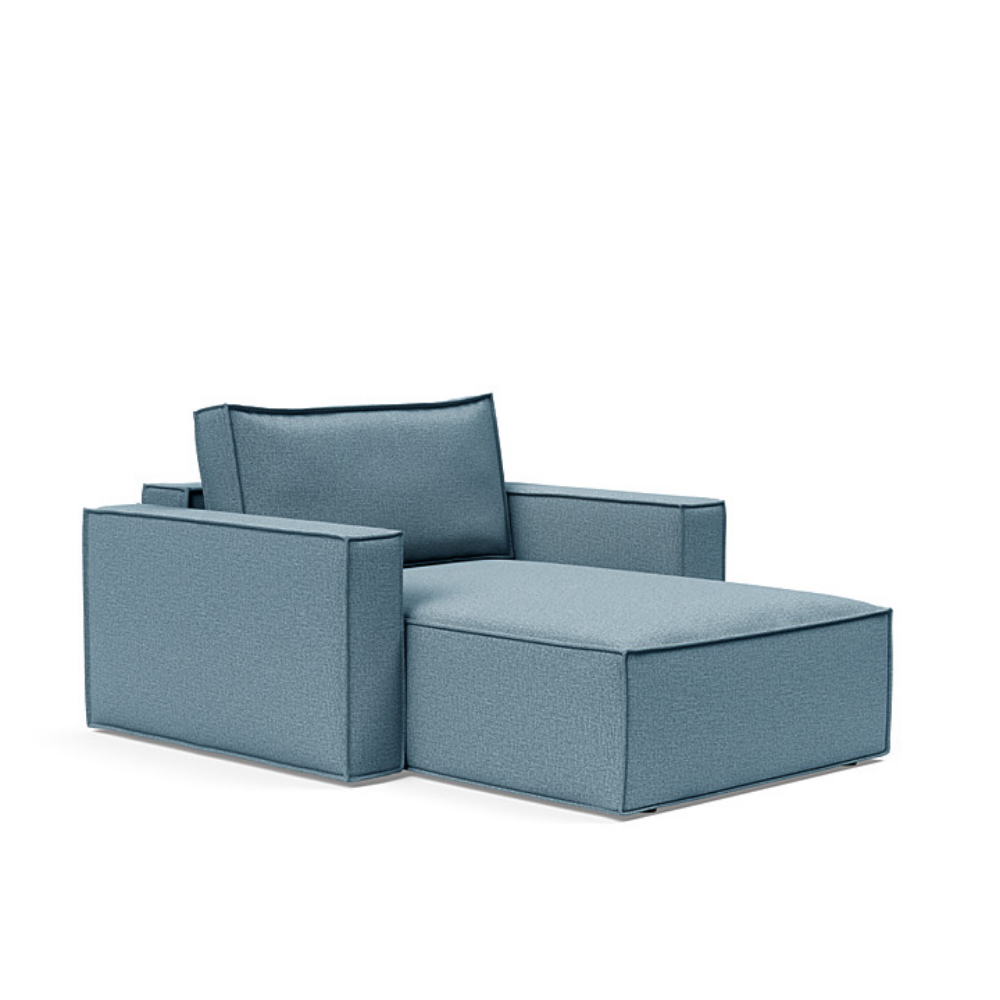 The Newilla Lounger Chair with Standard Arms from Innovation Living with mixed dance light blue 525 upholstery setup as a lounge chair.