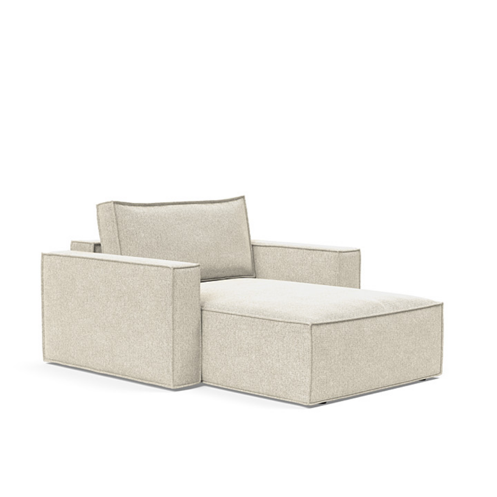 The Newilla Lounger Chair with Standard Arms from Innovation Living with taura off white 357 upholstery setup as a lounge chair.