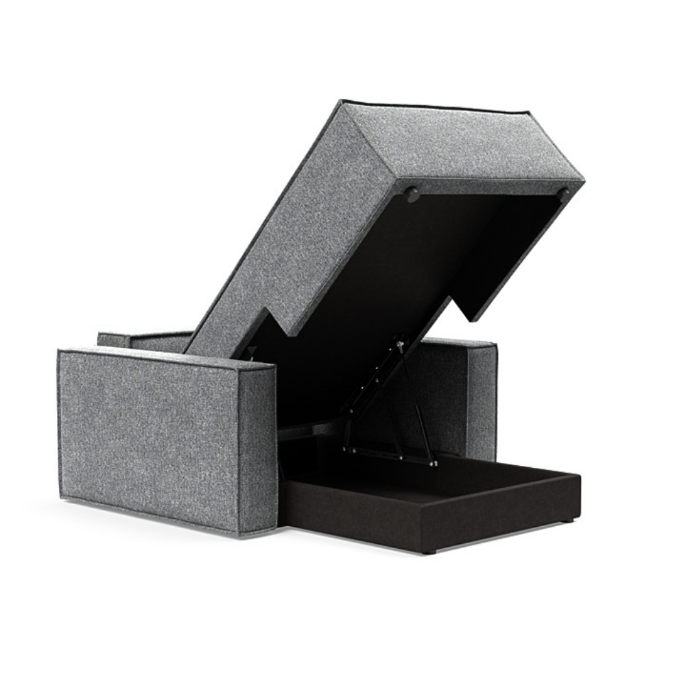 The Newilla Lounger Chair with Standard Arms from Innovation Living with taura slate grey 351 upholstery open and showing the internal storage.