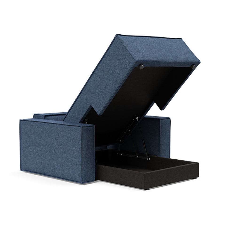 The Newilla Lounger Chair with Standard Arms from Innovation Living with weda blue 302 upholstery open and showing the internal storage.