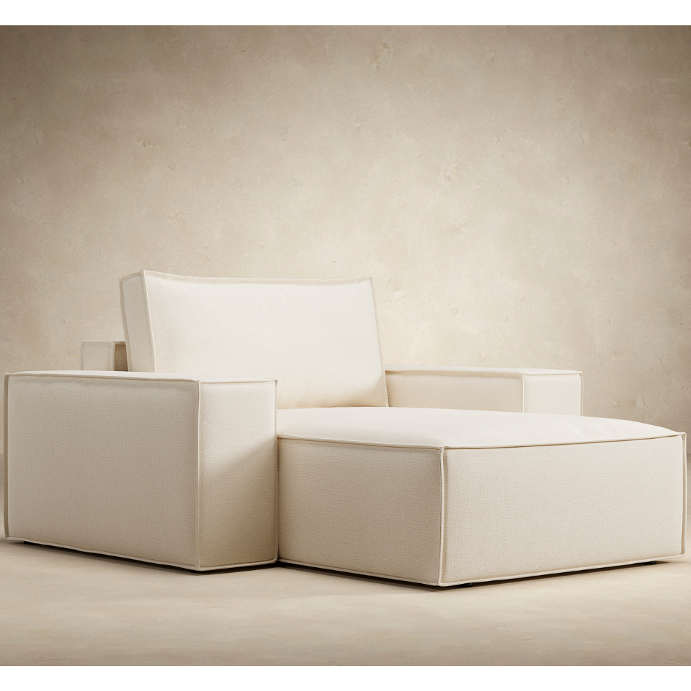 The Newilla Lounger Chair with Wide Arms from Innovation Living from an angle in a family area. all-groups