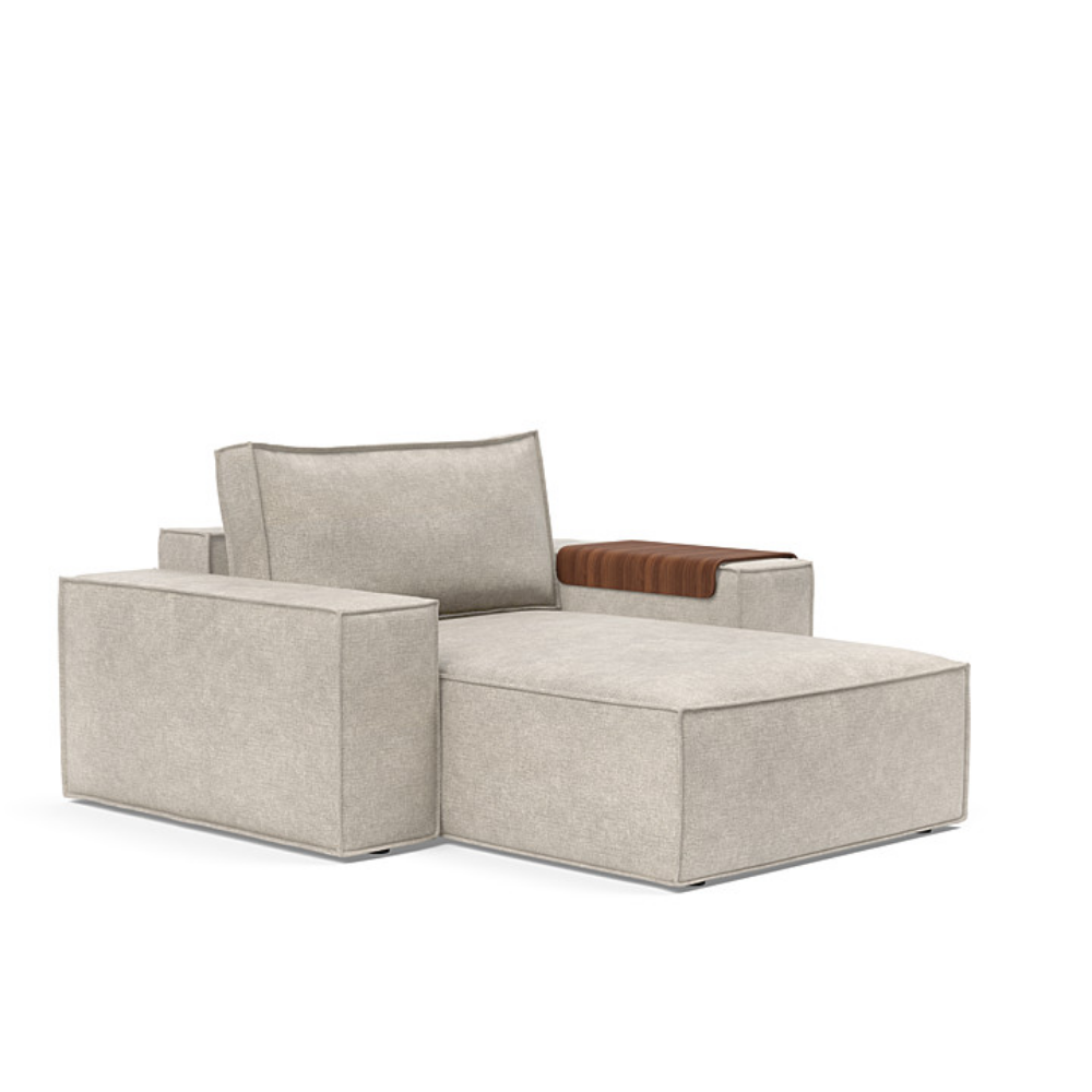 The Newilla Lounger Chair with Wide Arms from Innovation Living with avella sand 280 upholstery setup as a lounge chair.