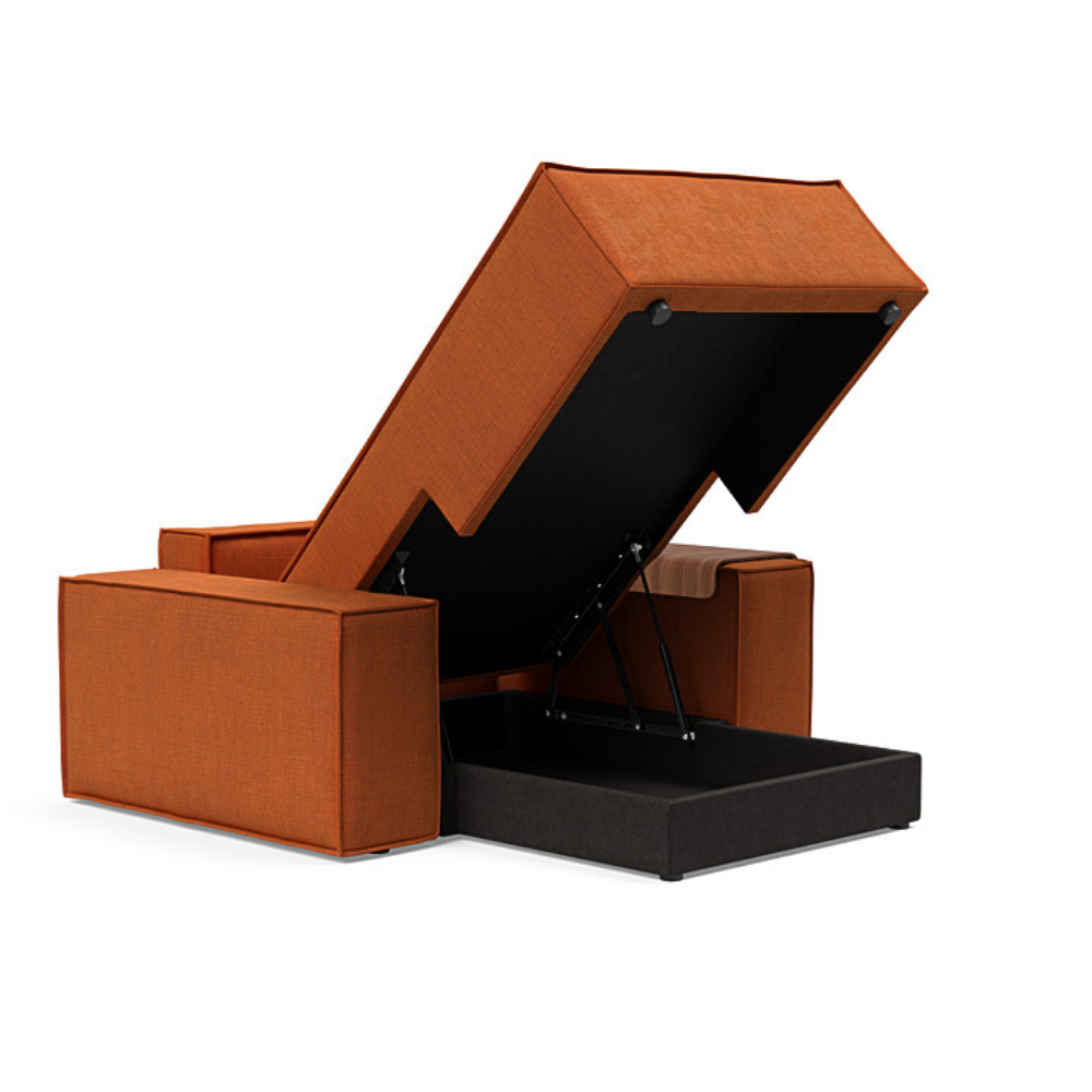 The Newilla Lounger Chair with Wide Arms from Innovation Living with esina rust orange 412 upholstery open showing the internal storage.