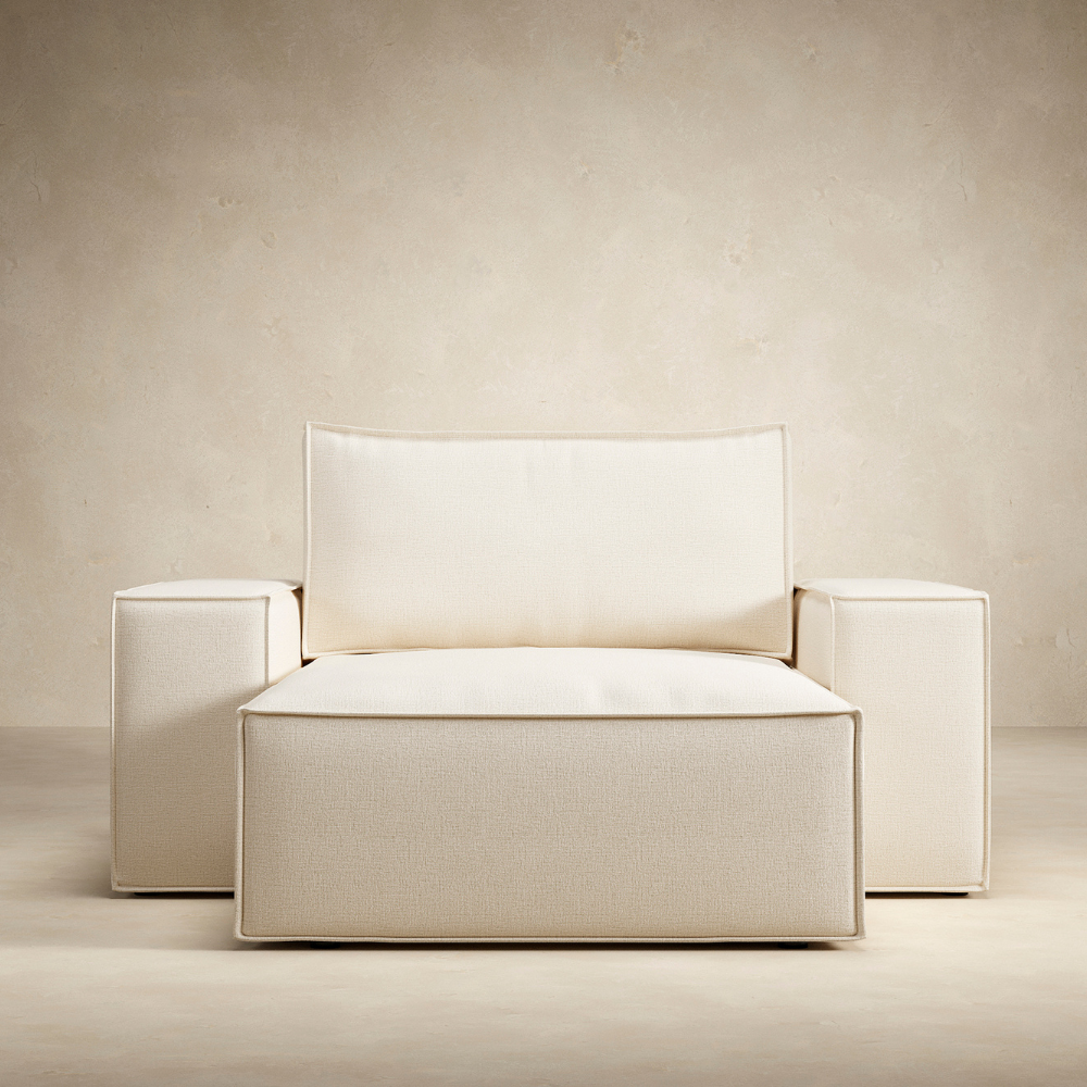 The Newilla Lounger Chair with Wide Arms from Innovation Living from the front in a living room. all-groups