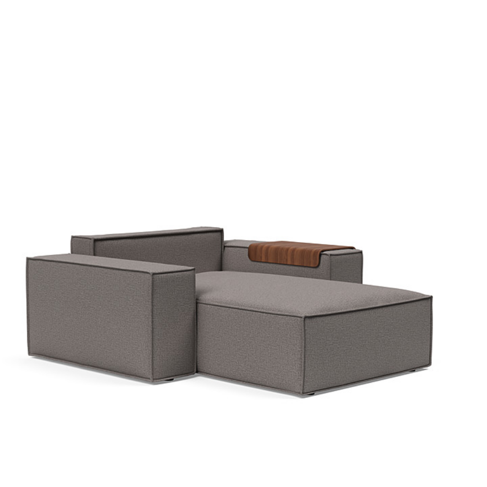 The Newilla Lounger Chair with Wide Arms from Innovation Living with mixed dance grey 521 upholstery without the cushion, setup as a bed.