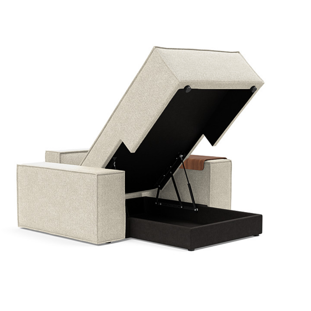 The Newilla Lounger Chair with Wide Arms from Innovation Living with taura off white 357 upholstery open showing the internal storage.