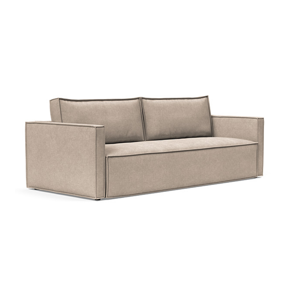 The Newilla Sleeper Sofa from Innovation Living with slim arms and adario taupe 257 upholstery setup as a sofa.