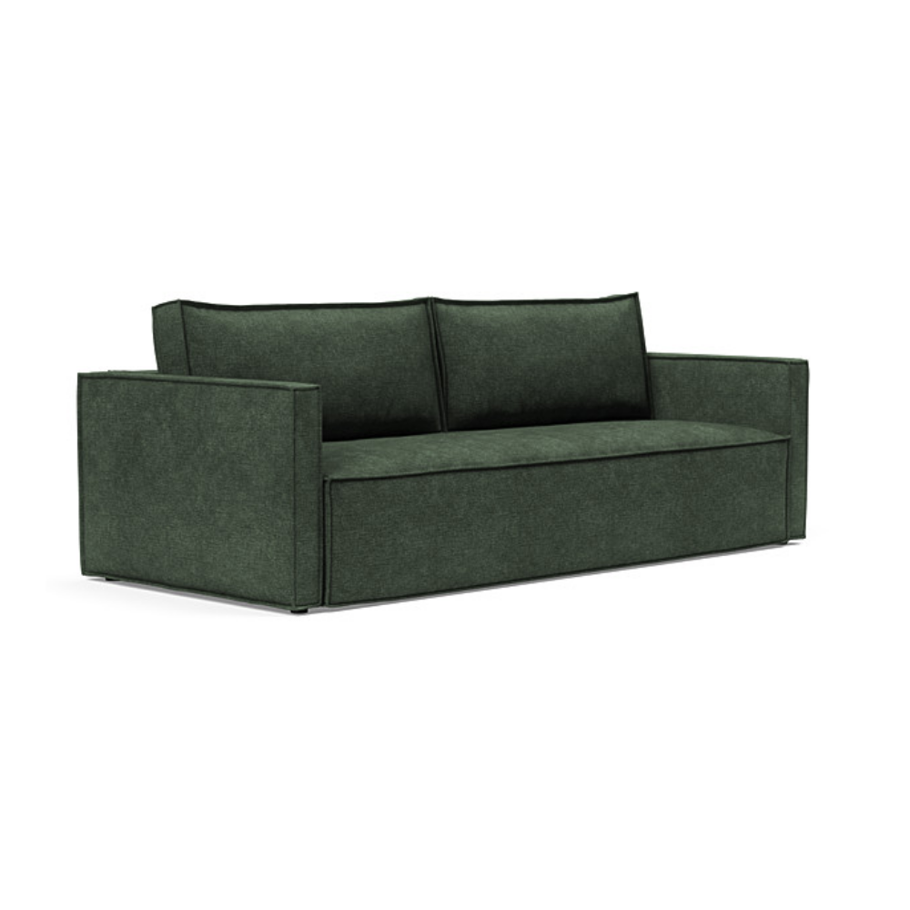 The Newilla Sleeper Sofa from Innovation Living with slim arms and avella pine green 281 upholstery setup as a sofa.