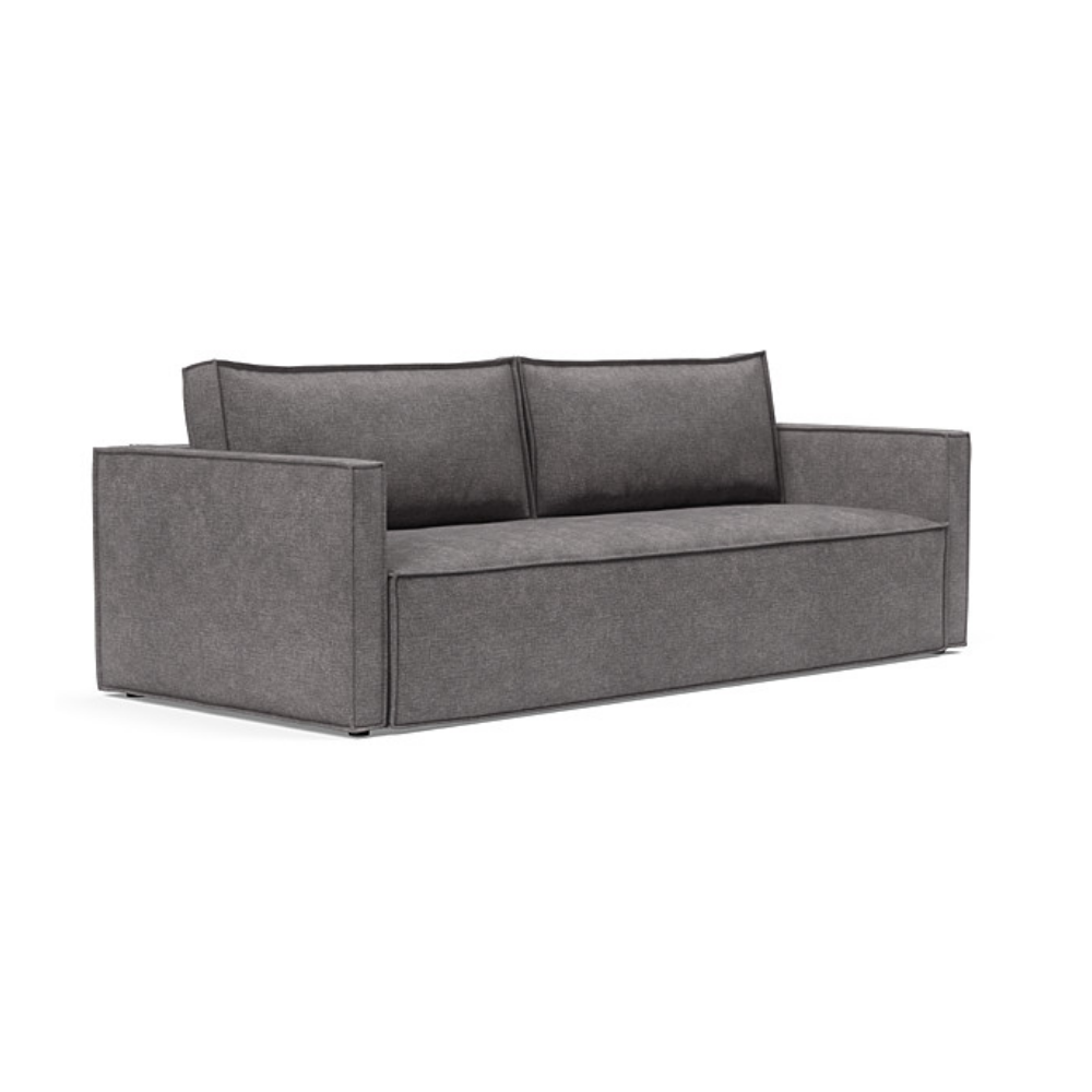 The Newilla Sleeper Sofa from Innovation Living with slim arms and avella warm grey 282 upholstery setup as a sofa.