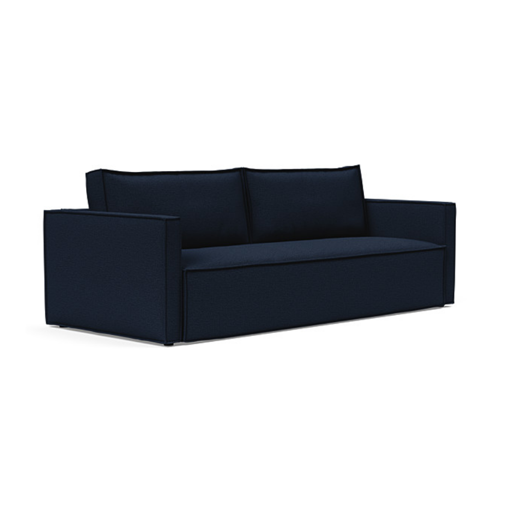 The Newilla Sleeper Sofa from Innovation Living with slim arms and mixed dance blue 528 upholstery setup as a sofa.